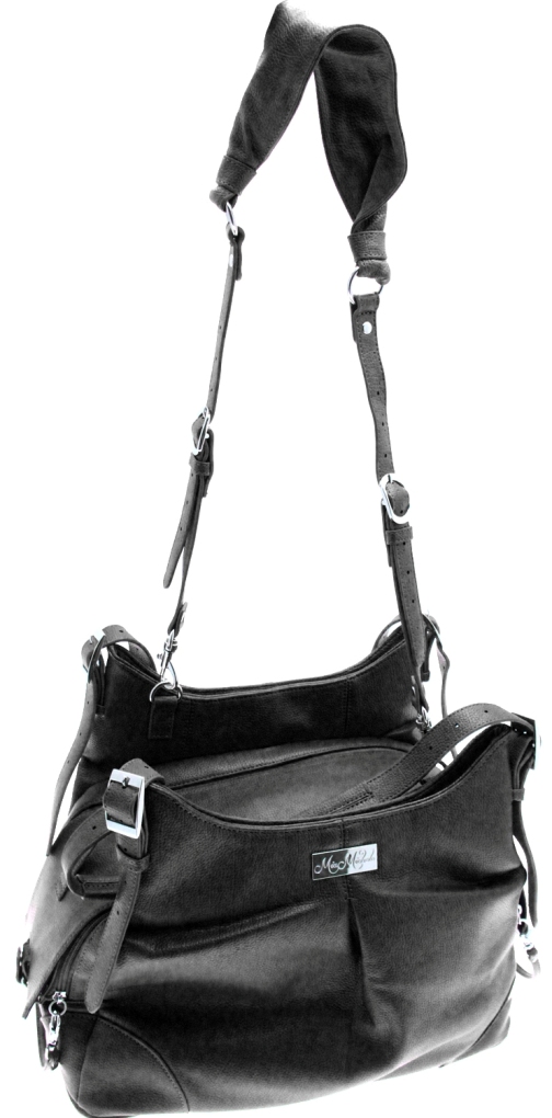 Doggie Design - Sadie Black Faux Pebble Leather Carry Bag - Airline Approved. Doggie Design's new Sadie Carry Bag was made to look like a Womans Designer Hand Bag. Now you can take your little Angel with you wherever you go and NO ONE will ever know whats inside your bag. It features High Quality Pebbled Black Faux Leather and is lined with Satin Black Waterproof Fabric. Your little Angel will LOVE the super soft plush pillow with removable and washable cover. The inside pillow is covered with waterproof fabric. The Sadie Bag features 2 large pockets for storage. It has plenty of room for your personal items, including your I-Pad or Tablet. "Sadie" is vented on the top and can be concealed for Privacy.  Includes shoulder strap, leash tether, and has metal feet on the bottom to provide protection to the bag.  Size Dimensions: 15 Inch Length x 10 Inch High (Outside Top Flap Folds Down for Airline Sizing).  8 Inch High (Pet Compartment) x 8 Inch Wide.