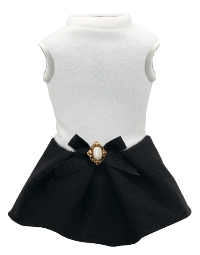 Hip Doggie - Classic Coco Sweater Dress - Cashmere-like super soft brushed sleeveless knit sweater dress with black and white bow with faux pearl & gold medallion on attached pleated black skirt. Stylish & comfortable to wear.  Made in USA.