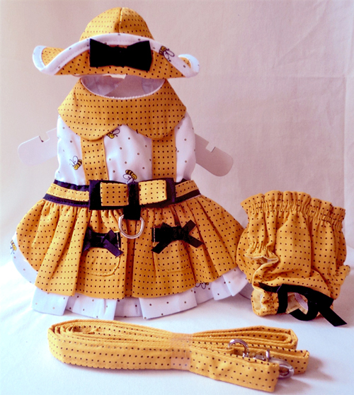 Platinum Puppy Couture - Busy Bee 4-pc Harness Dress Set - Rich goldenrod yellow with black polka dots jumper-styled harness dress, with white with goldenrod polka dots and bumble bees printed under-skirt and bodice.  Black bows accent the skirt's pockets.