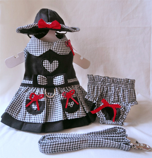 Platinum Puppy Couture - My Heart 4-pc Harness Dress Set - This smart and stylish harness dress is black, with contrasting black and white gingham print collar, over-skirt, and trim.  The bodice and pockets have heart-shaped cut-outs to show off the gingham print.  Red bow accents add a splash of color.