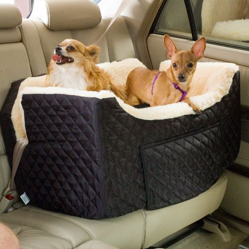 The Snoozer Large Lookout II dog car seat provides your pets the perfect place to ride together while on the move. Provide your pets the perfect place to ride together while on the move. Perfect for owners who own multiple pets, the Snoozer large lookout car seat is made with a simulated lamb's wool interior to provide yours pets with a cozy place to travel. For added convenience, there is a storage drawer compartment for all of your pets needs.