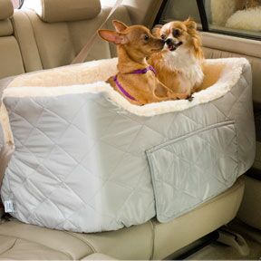 The Snoozer Large Lookout II dog car seat provides your pets the perfect place to ride together while on the move. Provide your pets the perfect place to ride together while on the move. Perfect for owners who own multiple pets, the Snoozer large lookout car seat is made with a simulated lamb's wool interior to provide yours pets with a cozy place to travel. For added convenience, there is a storage drawer compartment for all of your pets needs.