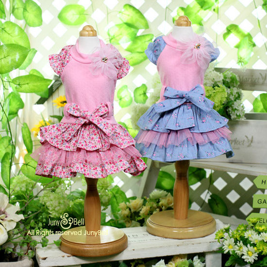 Juny Bell - My Girl (Blue or Pink) - Double-sided cotton fabric makes this fun and flirty dress soft and comfortable to wear.  Three-tiered ruffle skirt is designed with one netted ruffle and two printed ruffles.  A fixed-belt accented with a bow, and puffy sleeves add to the cuteness of this dress.  Netted corsage included.