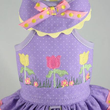 Toni Mari - Spring Tulips Embroidered Halter Harness Dress - This fully-lined, embroidered halter dress in lavender and yellow, is 100% cotton, features a dove collar, and tulle underlay.  Velcro closures at neck and chest.  D-ring.